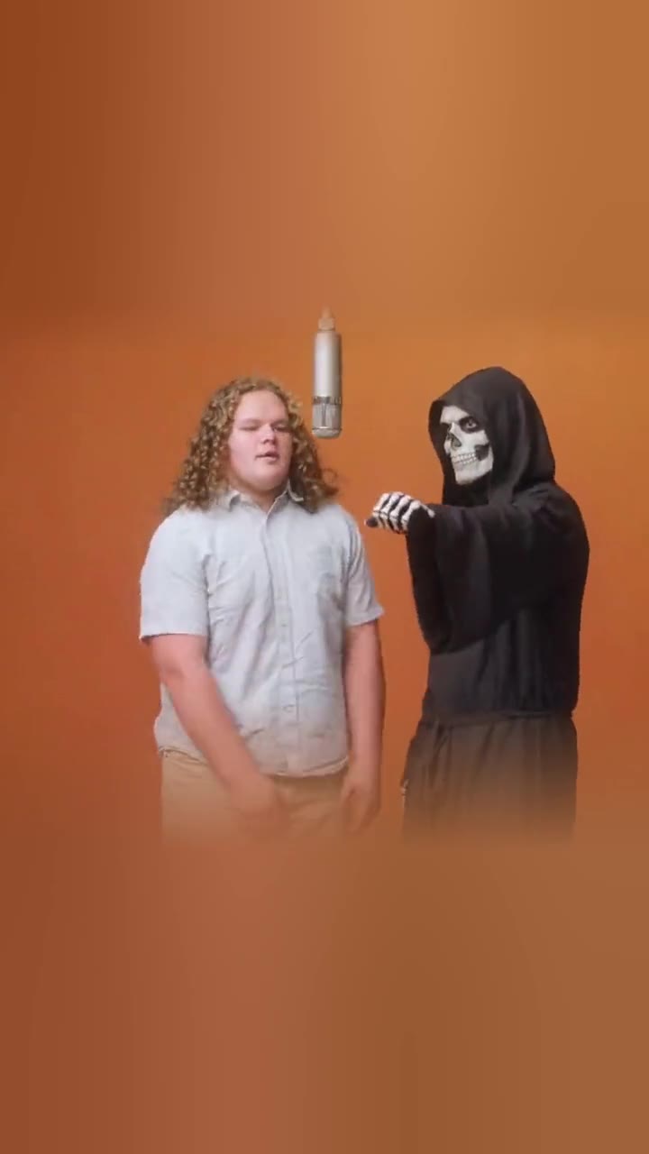 A guy and the grim reaper doing the full routine.